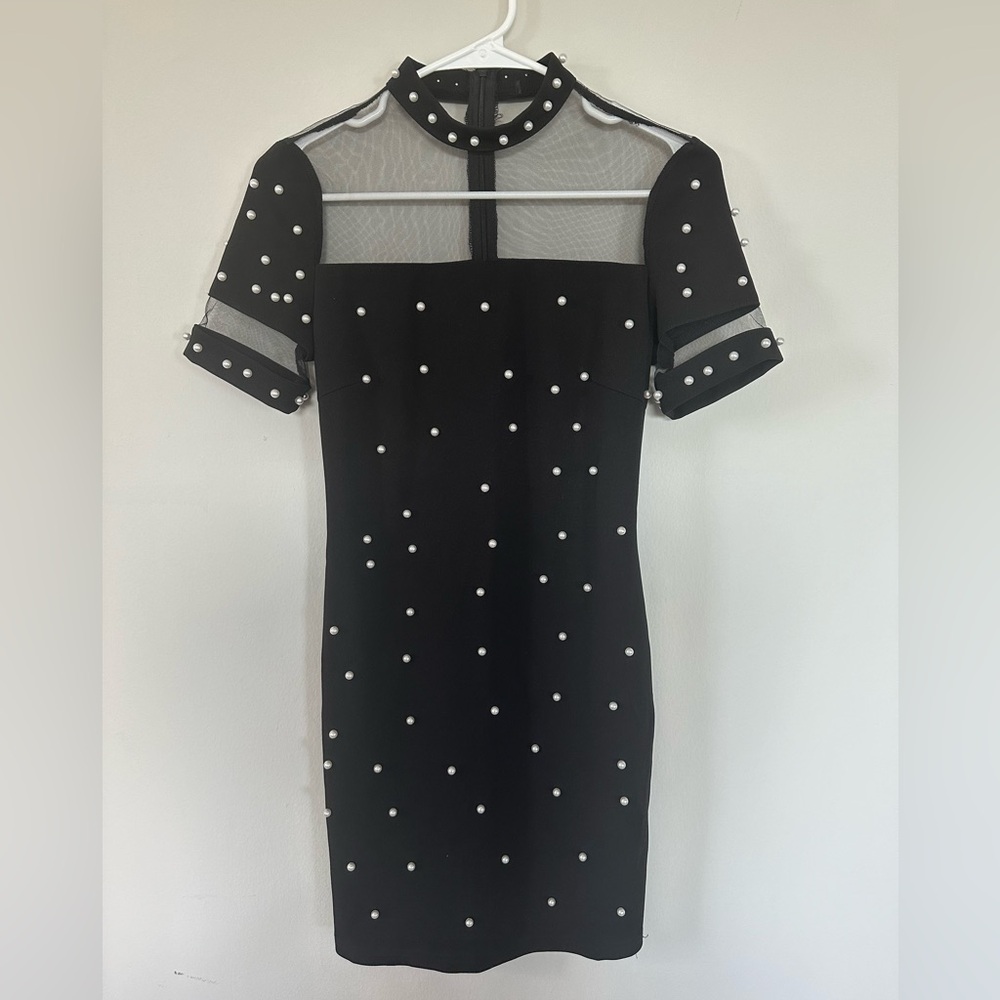 Black mini dress with pearls
